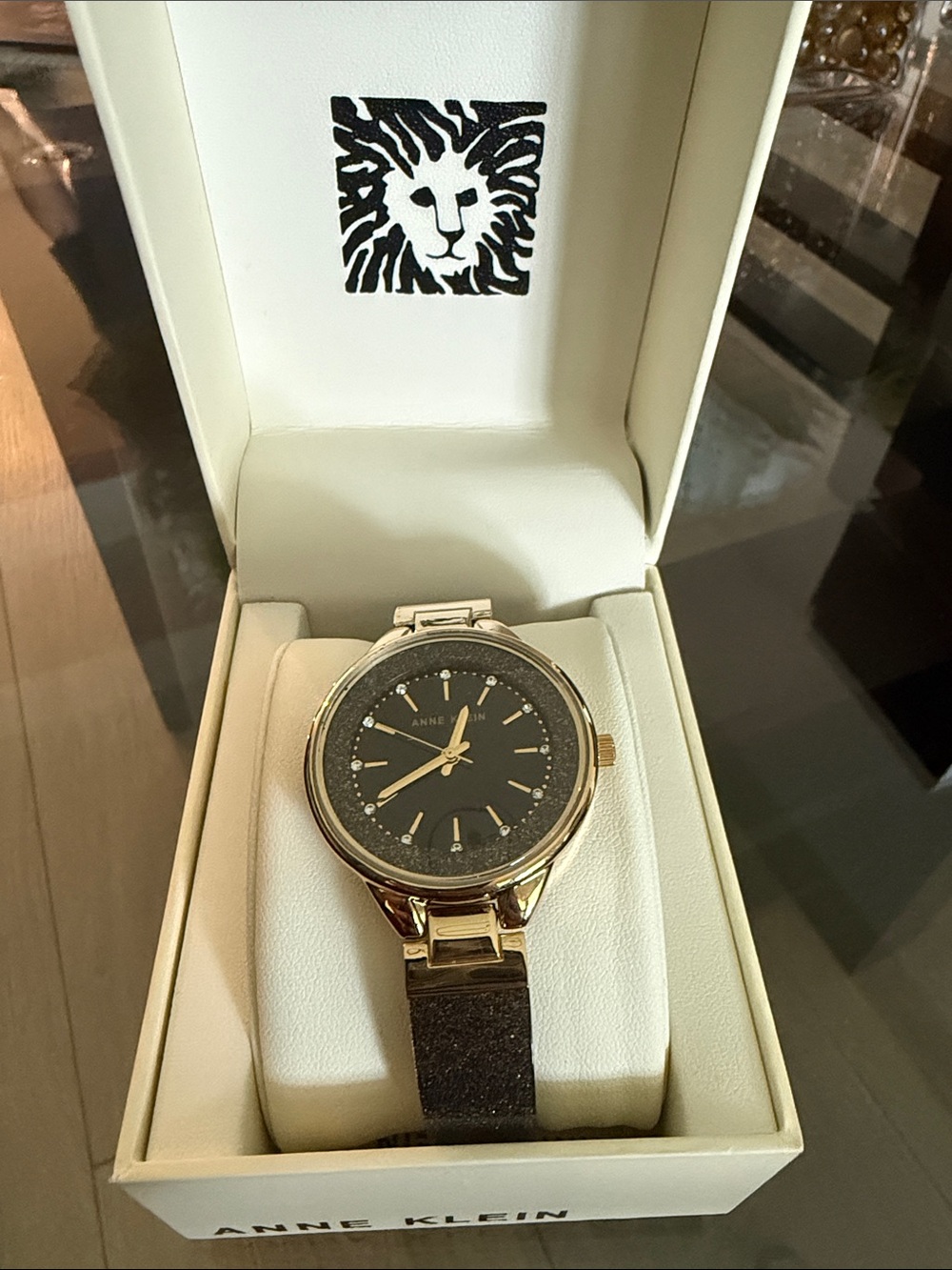 Anne Klein Gold-Tone Watch with Black Dial and Brown Strap